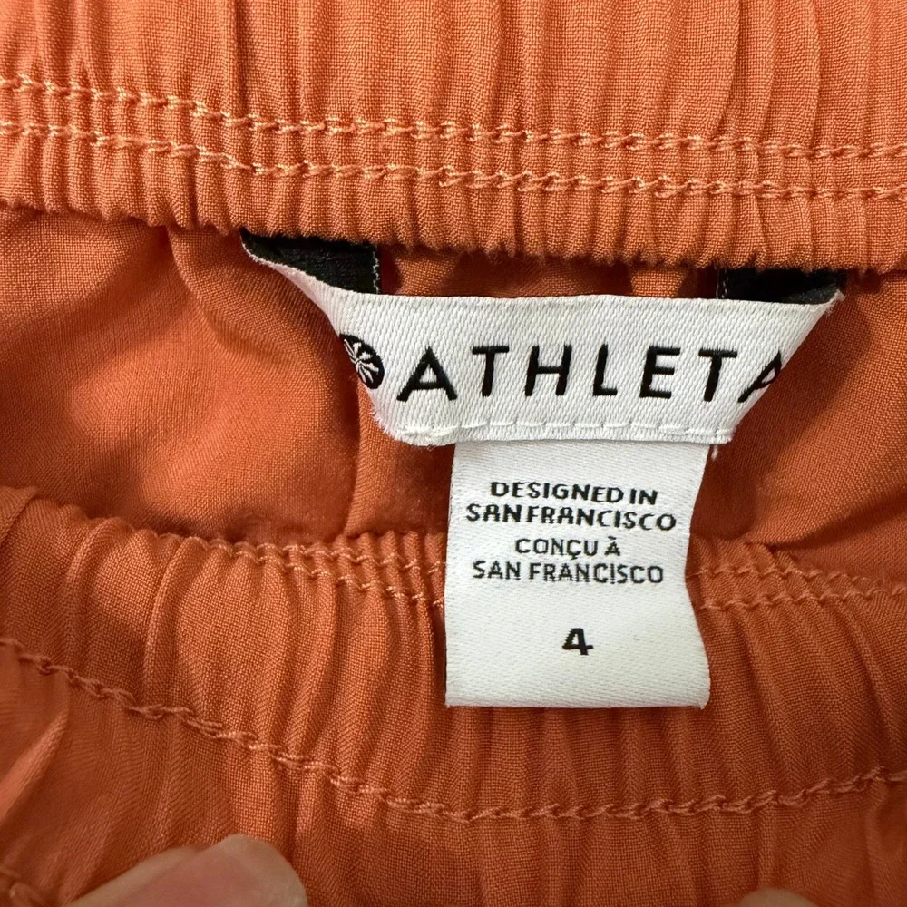 Athleta A-Line Midi Skirt 4 Womens Burnt Orange Zipper Pockets Elastic Earthy